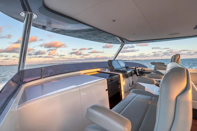 Slide: The Image of Luxurious 2021 Sirena 88 yacht helm with ocean view at sunset. - 21