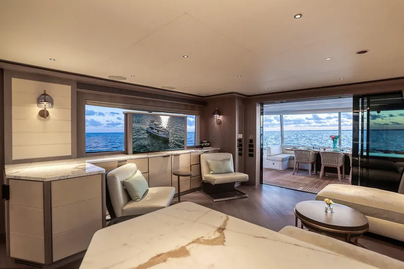 Slide: The Image of Luxurious interior of 2021 Sirena 88 yacht with ocean view and elegant furnishings. - 31