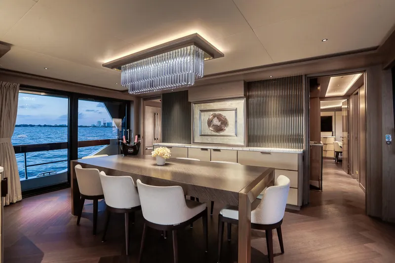 Slide: The Image of Luxurious dining area on 2021 Sirena 88 yacht with elegant decor and ocean view. - 37