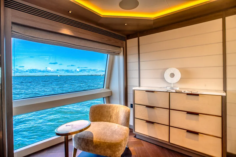 Slide: The Image of Luxurious interior of 2021 Sirena 88 yacht with ocean view and elegant furnishings. - 46