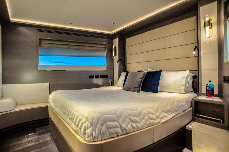Slide: The Image of Luxurious bedroom interior of 2021 Sirena 88 yacht with modern design and ambient lighting. - 52