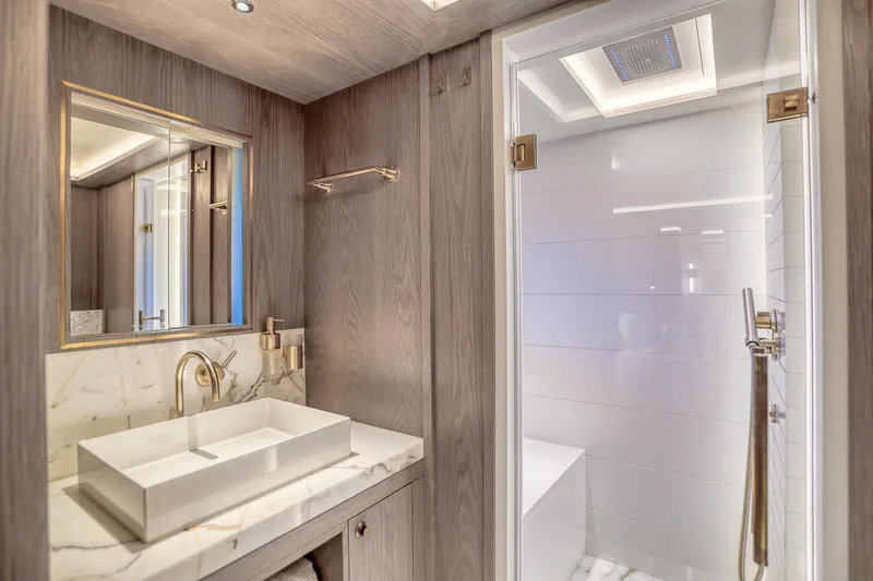 Slide: The Image of Luxurious bathroom in 2021 Sirena 88 yacht with modern sink and shower. - 63