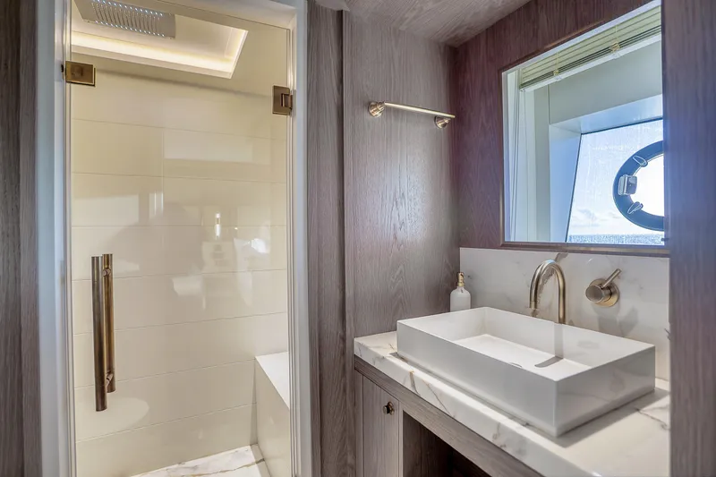 Slide: The Image of Luxurious bathroom in 2021 Sirena 88 yacht with modern sink and shower. - 66