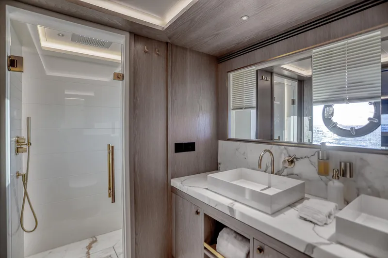 Slide: The Image of Luxurious bathroom on 2021 Sirena 88 yacht with marble sink and modern shower. - 70