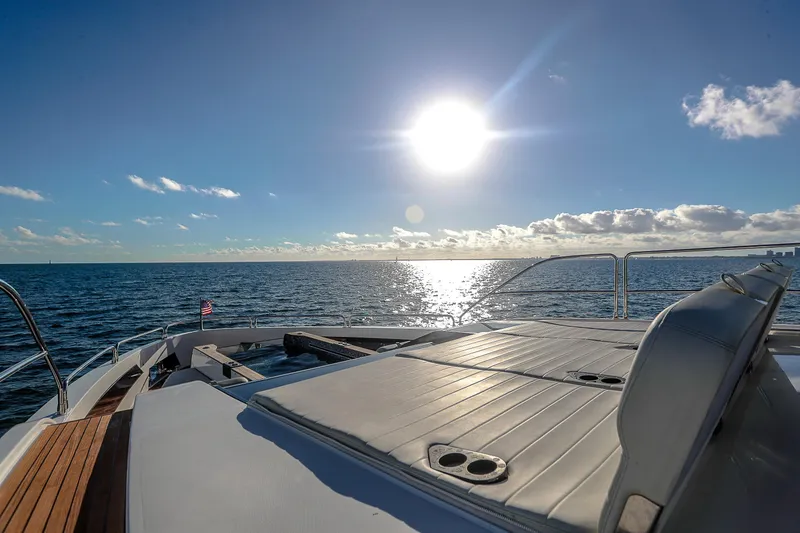 Slide: The Image of Luxurious 2021 Sirena 88 yacht deck with ocean view and bright sun. - 9