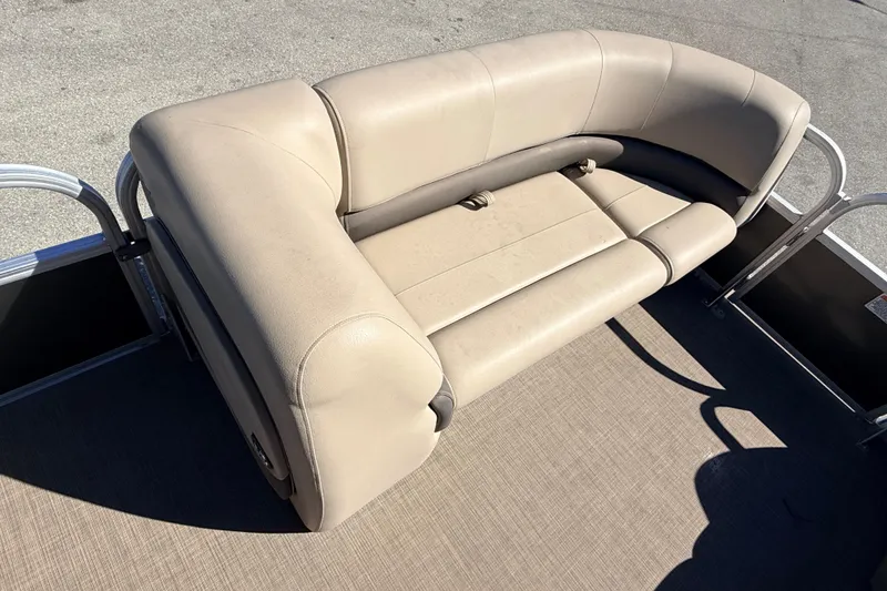 Slide: The Image of 2023 Sun Tracker Party Barge 18 DLX pontoon boat seating, beige upholstery. - 10
