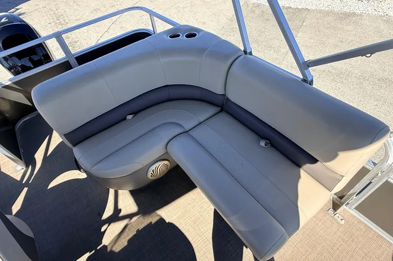 Slide: The Image of 2023 Sun Tracker Party Barge 18 DLX pontoon seating with cup holders and speaker. - 13
