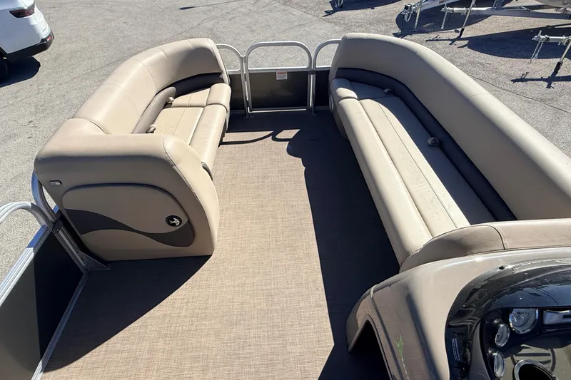 Slide: The Image of 2023 Sun Tracker Party Barge 18 DLX interior with spacious seating and modern design. - 9