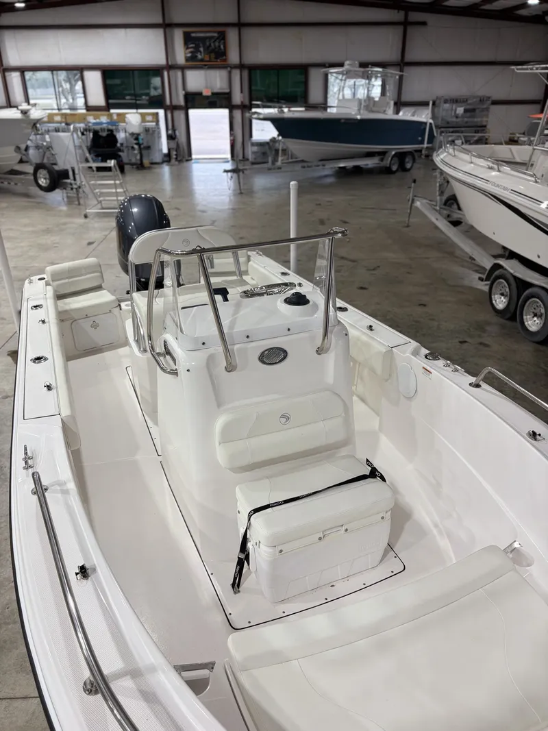 Slide: The Image of Edgewater 188CC 2021 boat inside a storage facility. - 11