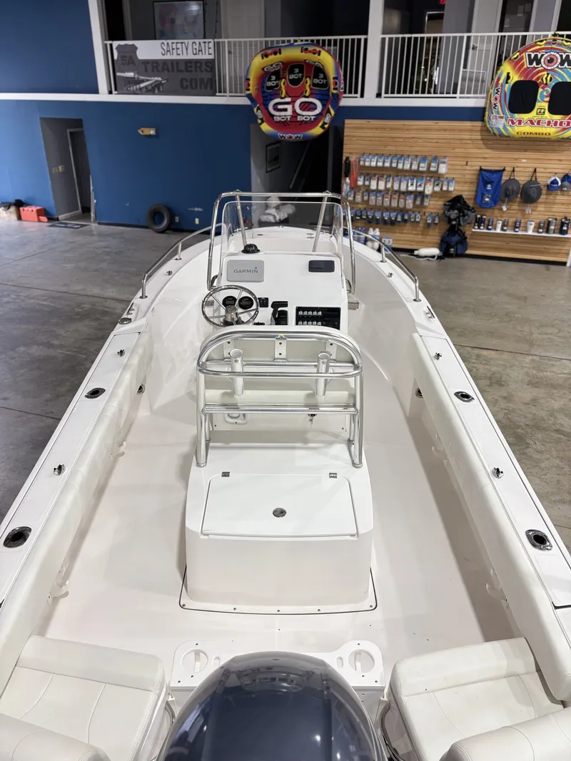 Slide: The Image of Interior view of a 2021 Edgewater 188CC boat in a warehouse. - 3