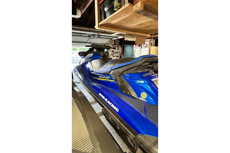 Slide: The Image of 2017 Yamaha WaveRunner FX Cruiser SVHO in a garage, blue color, side view. - 12
