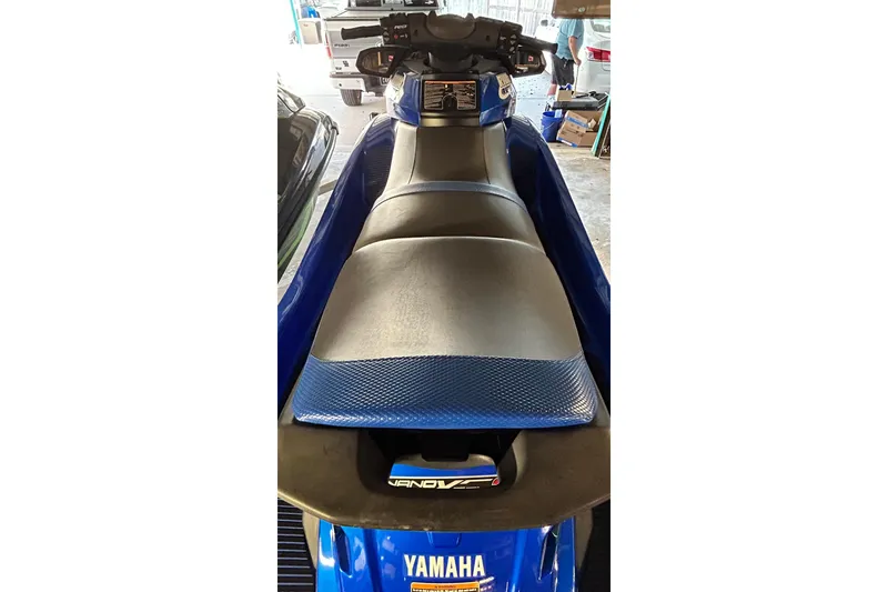 Slide: The Image of 2017 Yamaha WaveRunner FX Cruiser SVHO, blue jet ski, parked indoors. - 23