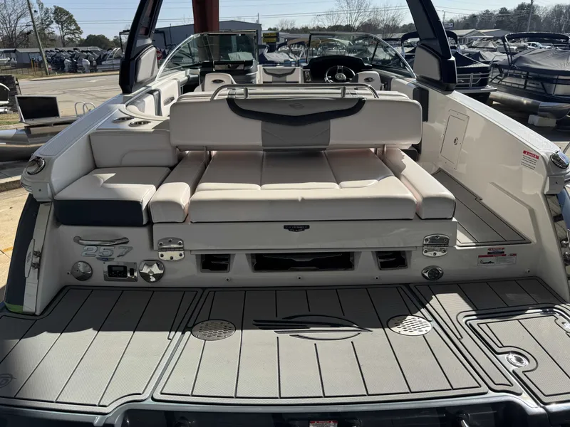 Slide: The Image of Rear view of 2020 Chaparral 257 SSX boat with lounging area. - 16