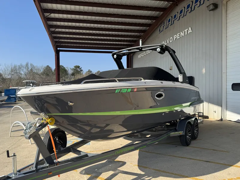 Slide: The Image of 2020 Chaparral 257 SSX boat on trailer outside warehouse. - 3