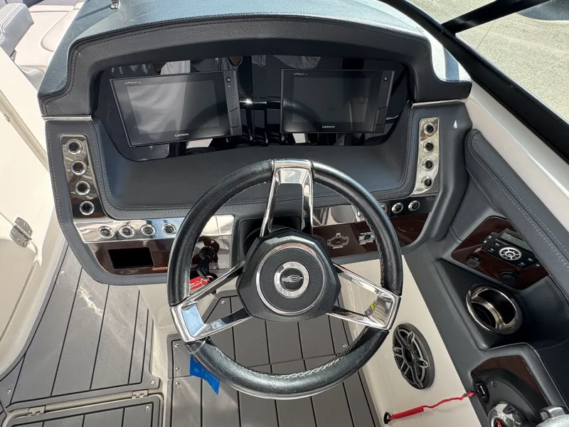 Slide: The Image of 2020 Chaparral 257 SSX boat helm with modern displays. - 4
