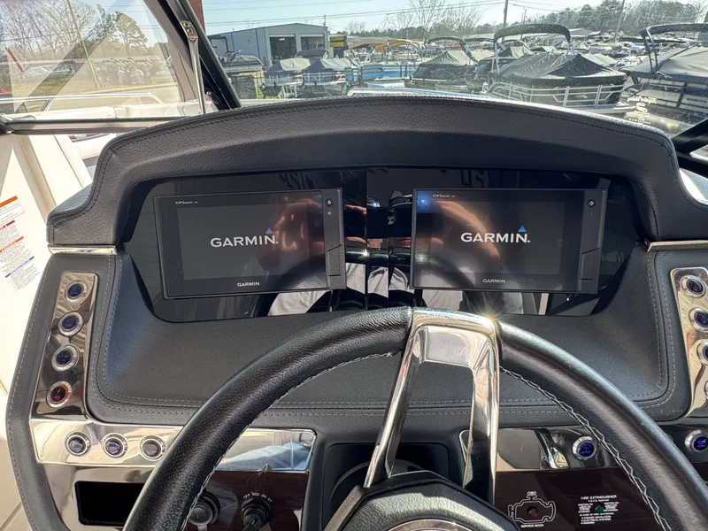 Slide: The Image of Dashboard of 2020 Chaparral 257 SSX with Garmin displays. - 5
