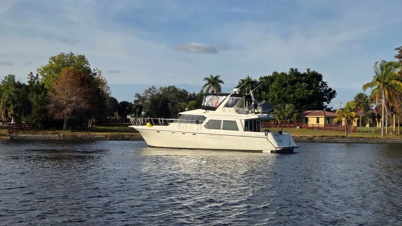 Slide: The Image of 1998 Navigator 5300 yacht on calm waters. - 2