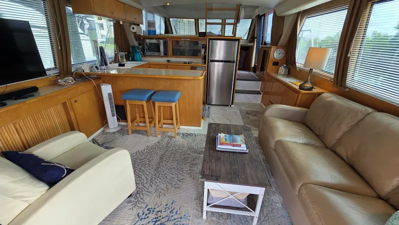 Slide: The Image of Interior of a 1998 Navigator 5300 yacht with modern amenities. - 21