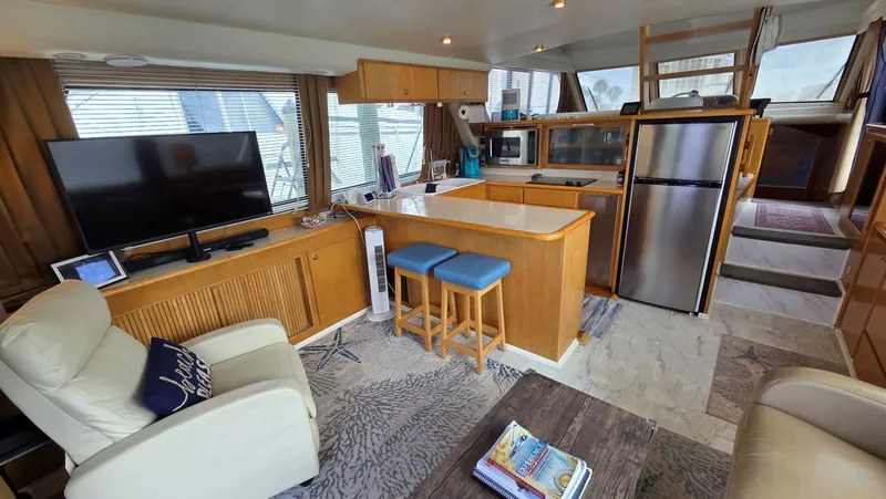 Slide: The Image of Interior of a 1998 Navigator 5300 yacht with modern amenities. - 22