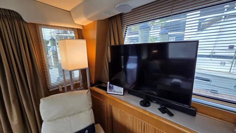 Slide: The Image of Interior of a Navigator 5300 yacht with TV and lamp. - 25