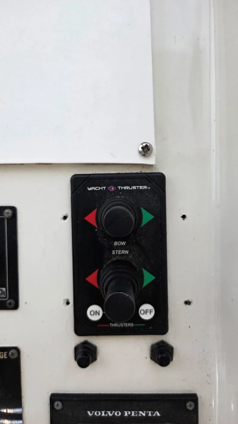 Slide: The Image of Control panel of a 1998 Navigator 5300 with Yacht Thruster controls. - 48