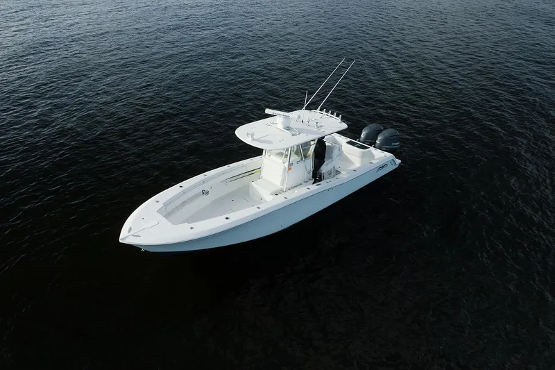 Slide: The Image of 2007 Invincible 33 Open Fisherman boat on calm water, aerial view. - 5