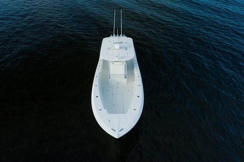 Slide: The Image of Aerial view of 2007 Invincible 33 Open Fisherman boat on calm water. - 7