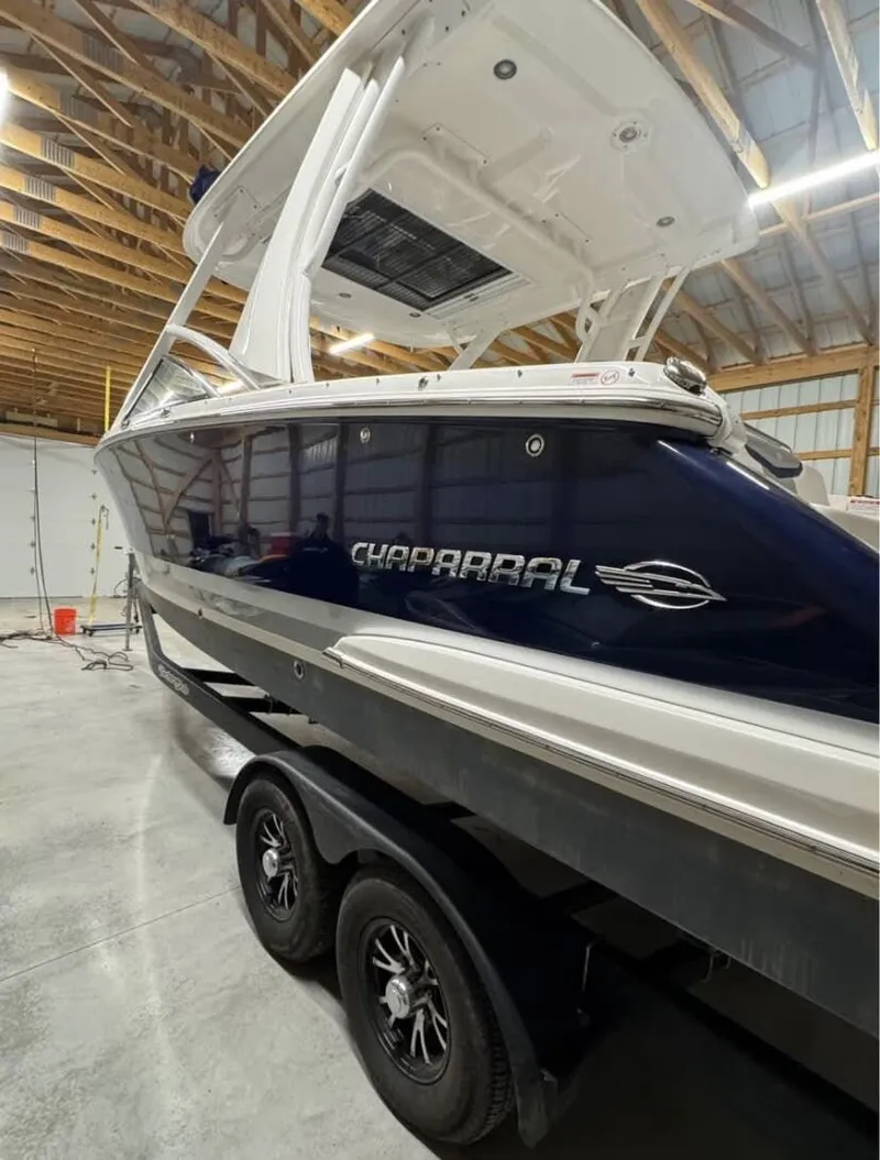 Slide: The Image of 2021 Chaparral OSX 280 boat in a storage facility. - 5