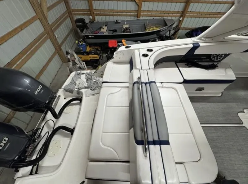 Slide: The Image of 2021 Chaparral OSX 280 boat in storage with engines. - 7