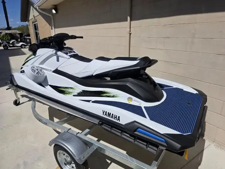 Slide: The Image of 2026 Yamaha WaveRunner VX Deluxe on trailer, side view. - 3