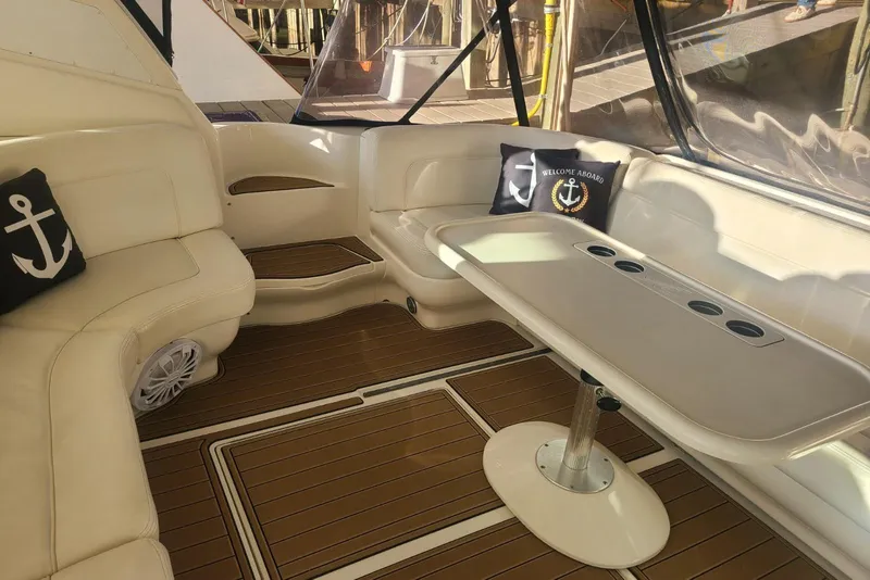Slide: The Image of Luxurious 2001 Sea Ray Sundancer 460 yacht interior with elegant seating and nautical decor. - 13