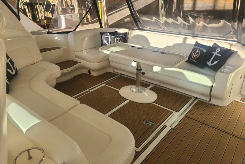 Slide: The Image of Luxurious 2001 Sea Ray Sundancer 460 yacht interior with elegant seating and nautical decor. - 31
