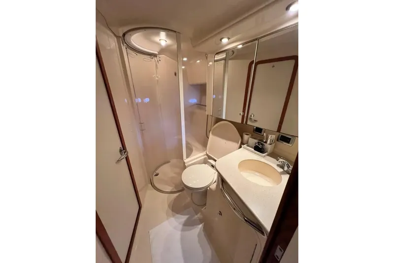 Slide: The Image of Luxurious bathroom in 2001 Sea Ray Sundancer 460 yacht with shower and vanity. - 47