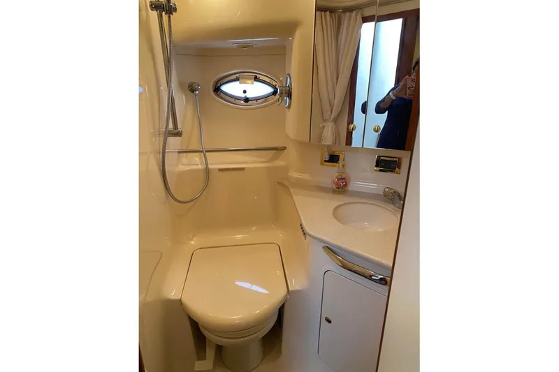 Slide: The Image of Bathroom interior of 2001 Sea Ray Sundancer 460 yacht, featuring shower and sink. - 51