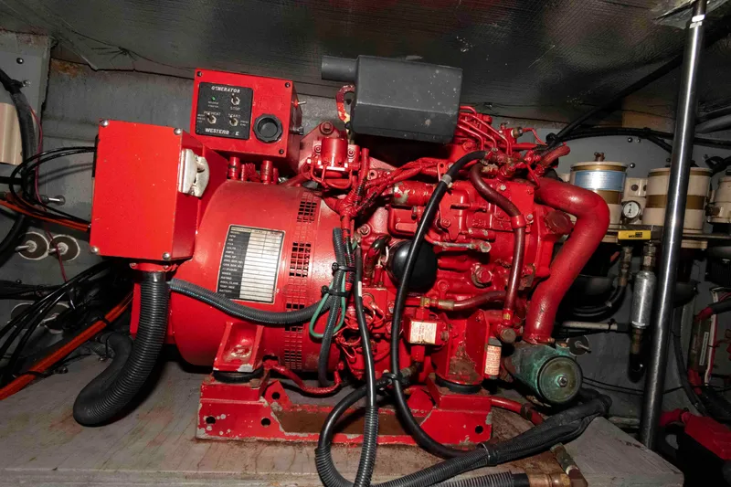 Slide: The Image of Red engine in a 2001 Sea Ray Sundancer 460 boat's engine room. - 57