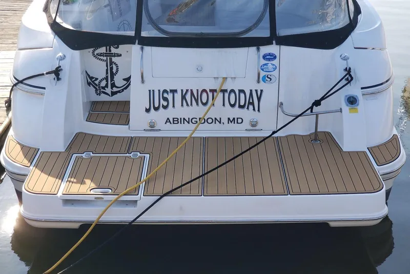 Slide: The Image of 2003 Cruisers Yachts 3470 Express boat with "Just Knot Today" name, docked in Abingdon, MD. - 8