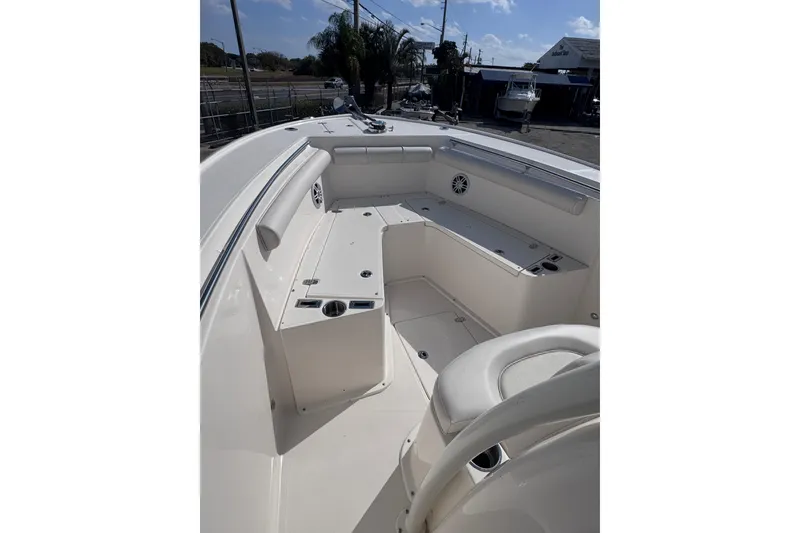 Slide: The Image of 2025 Sea Born SX239 Offshore boat interior with seating and storage compartments. - 17