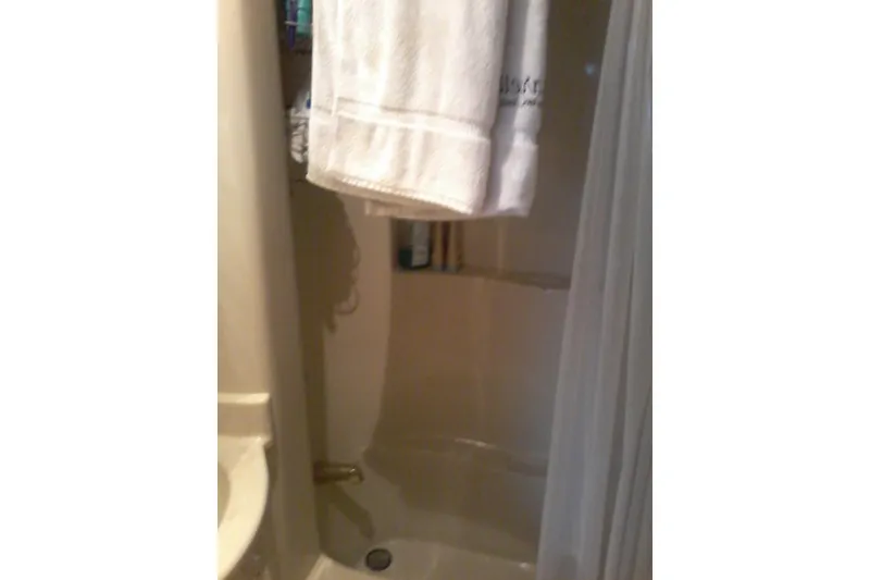 Slide: The Image of Compact bathroom shower in 2000 Bluewater 5800 Millenium yacht. - 18