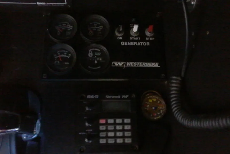 Slide: The Image of Control panel of a 2000 Bluewater 5800 Millenium with Westerbeke generator and VHF radio. - 25