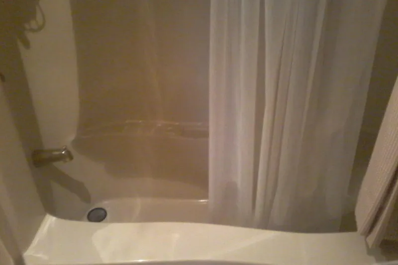 Slide: The Image of Shower area with curtain in 2000 Bluewater 5800 Millenium yacht bathroom. - 8