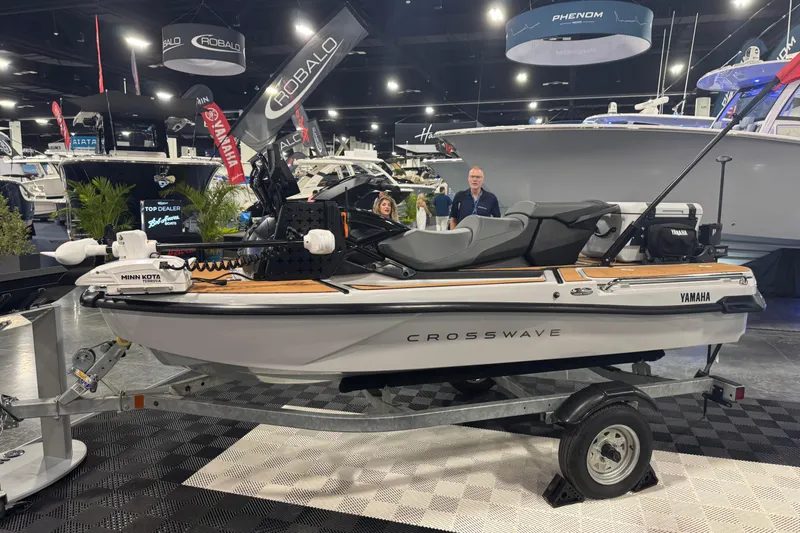 Slide: The Image of 2026 Yamaha WaveRunner Crosswave displayed at a boat show on a trailer. - 2