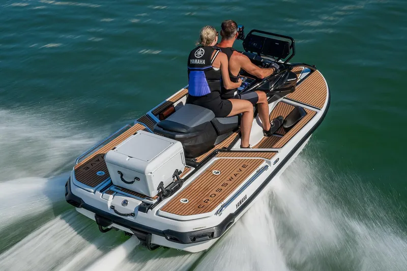Slide: The Image of Manufacturer Provided Image: 2026 Yamaha WaveRunner Crosswave jet ski on water, two riders enjoying a smooth ride. - 9