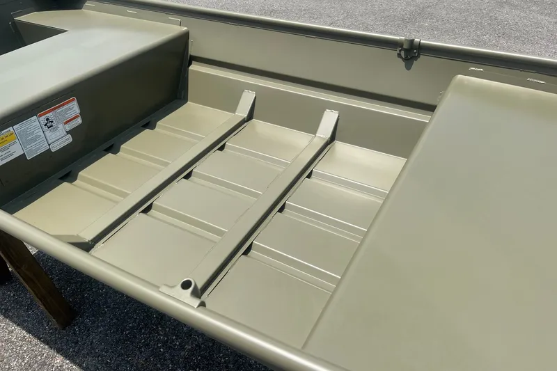 Slide: The Image of 2026 Tracker Grizzly 14 Jon boat interior with durable aluminum construction. - 7