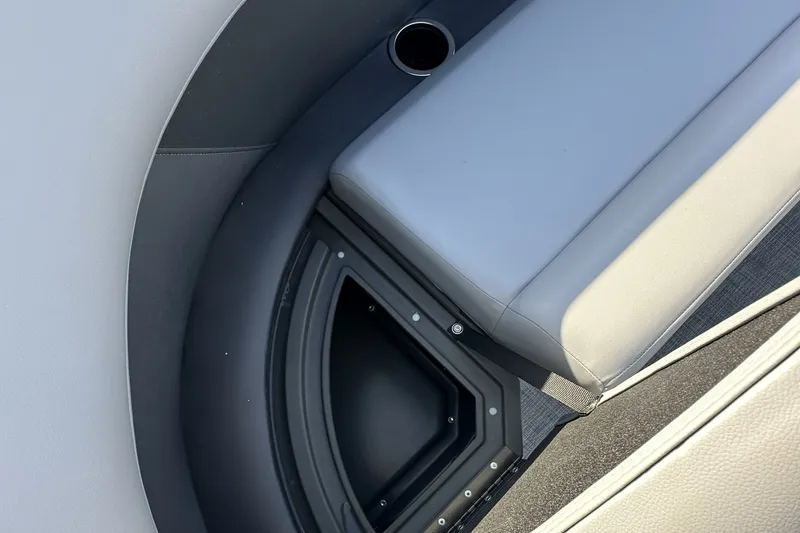 Slide: The Image of Interior seating of 2026 Sun Tracker Party Barge 16 DLX with storage compartment. - 39