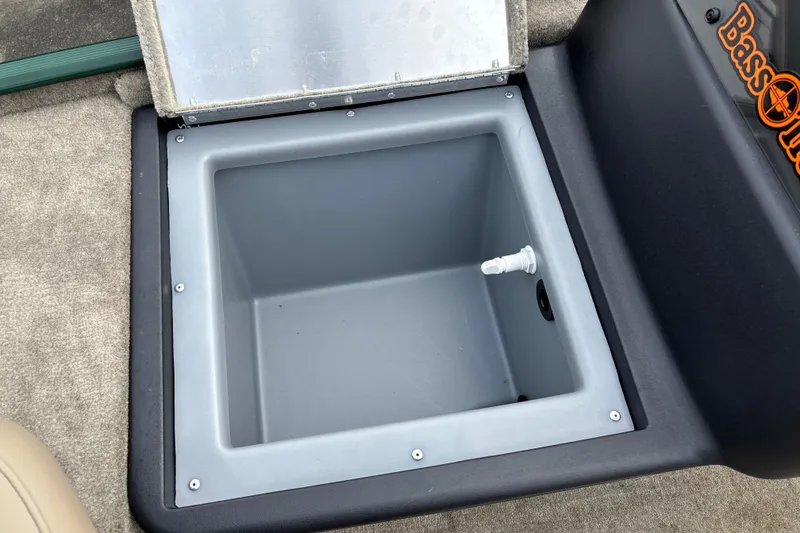 Slide: The Image of Open storage compartment in 2026 Tracker Bass Tracker Classic Limited boat. - 13