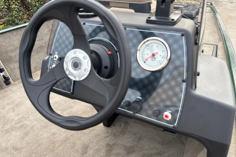 Slide: The Image of Steering wheel and dashboard of 2026 Tracker Bass Tracker Classic Limited boat. - 21