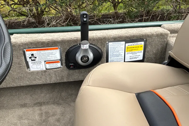 Slide: The Image of Interior of 2026 Tracker Bass Tracker Classic Limited boat with control panel and seating. - 19