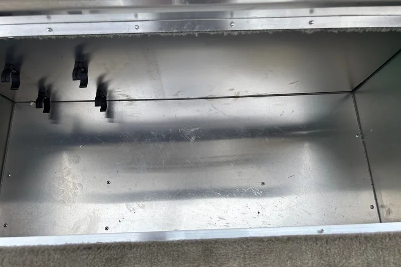 Slide: The Image of Empty storage compartment in 2026 Tracker Bass Tracker Classic Limited boat. - 15