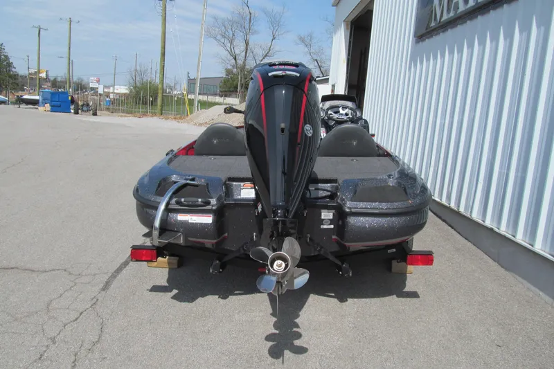 Slide: The Image of Rear view of a 2026 Nitro Z17 boat with an outboard motor. - 93