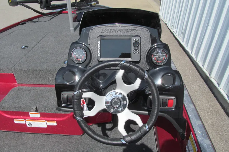 Slide: The Image of Steering console of a 2026 Nitro Z17 boat with gauges and Lowrance display. - 95